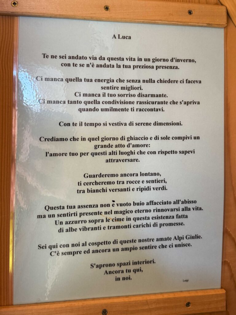 Poesia dedicata a Luca, con un paesaggio di montagna stilizzato.